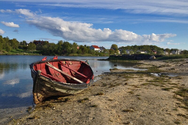 Red Rowboat on Shore — Blue