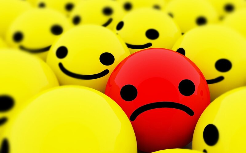 Red Sad Face Among Yellow — 3d Render