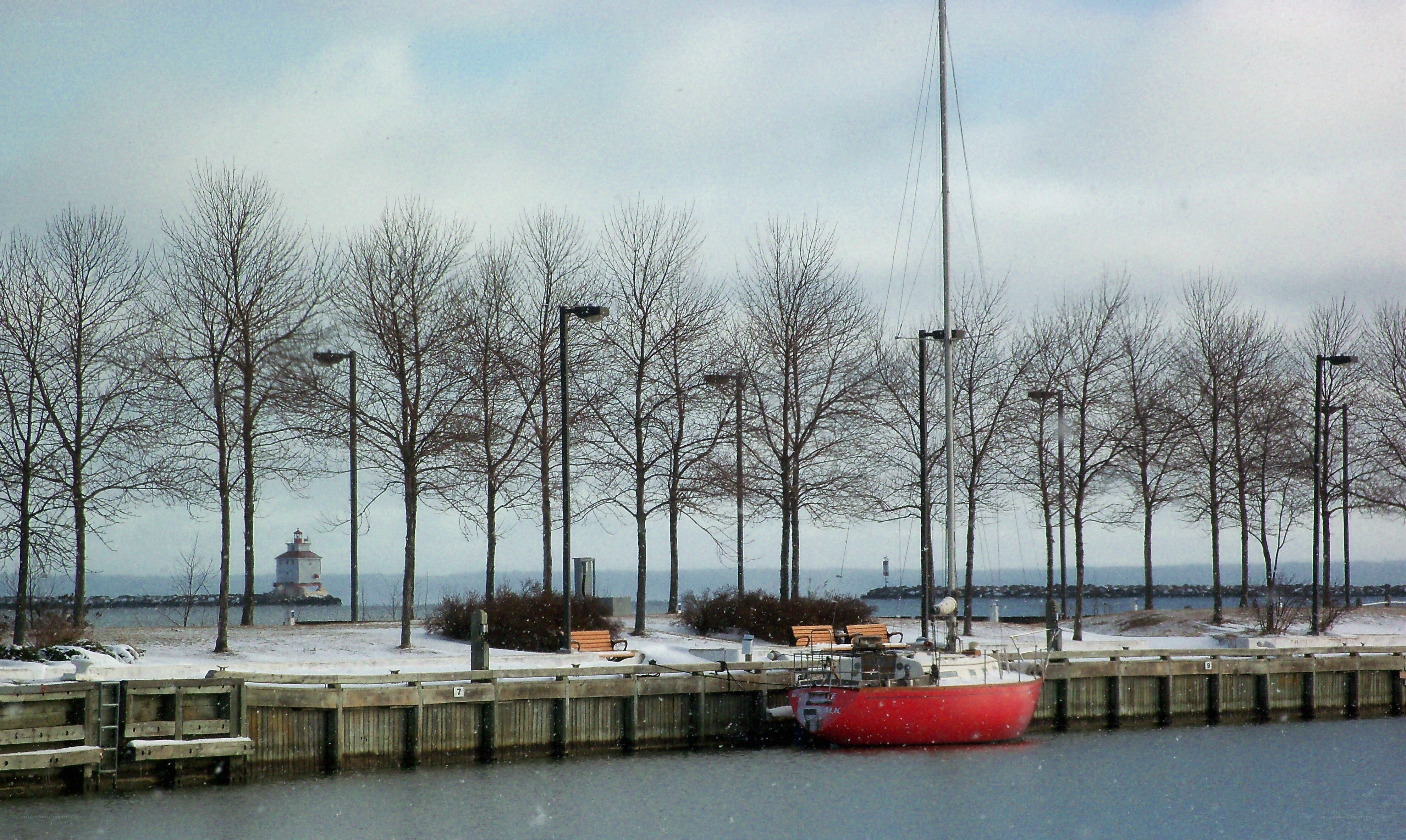 Red sailboat at winter marina