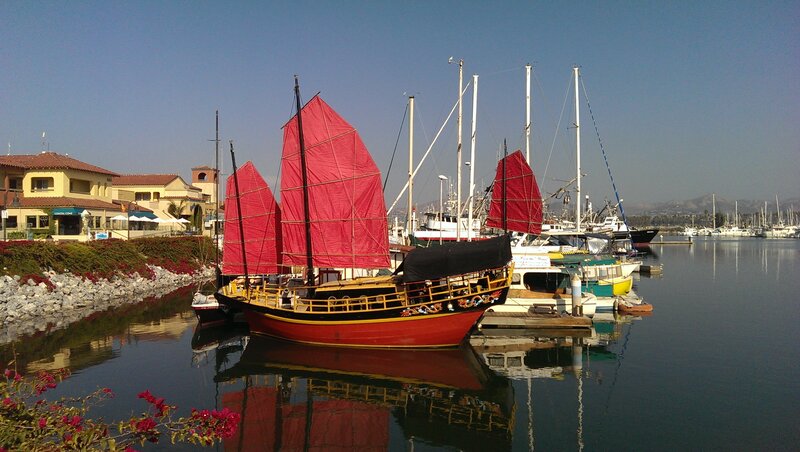 Red Sailboat in Harbor — Serene