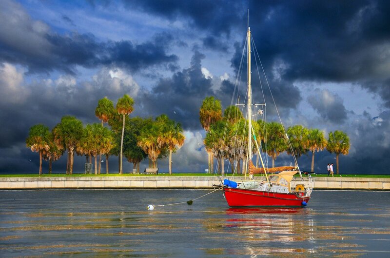 Red Sailboat in Water