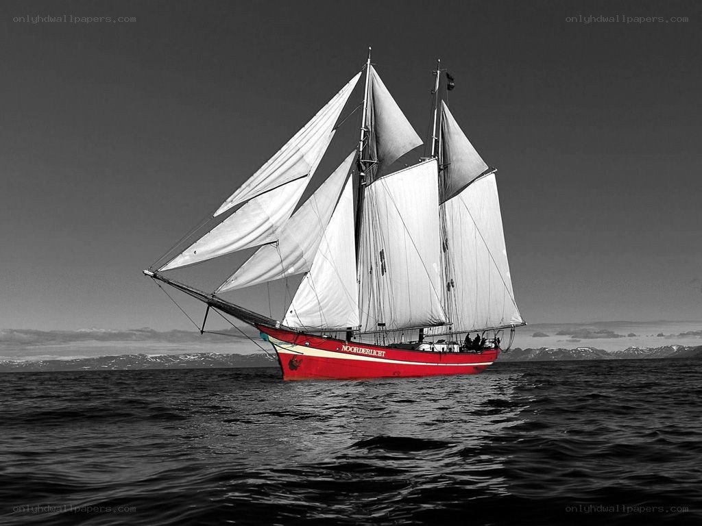 Red sailboat on the sea