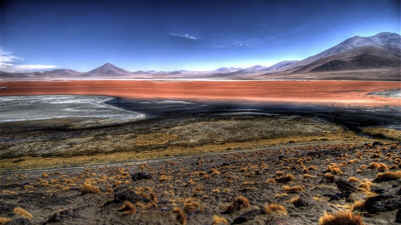 Red Salt Flat with Mountains