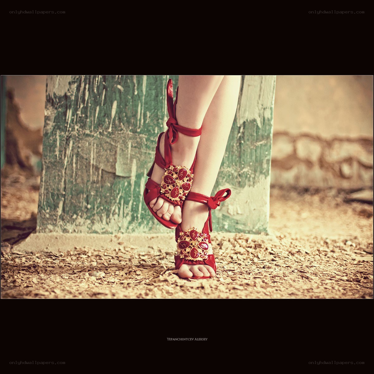 red sandals on feet