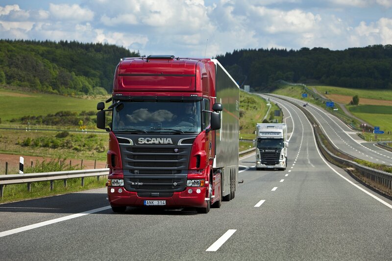 Red Scania truck on highway