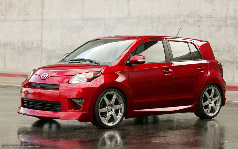Red Scion xD hatchback