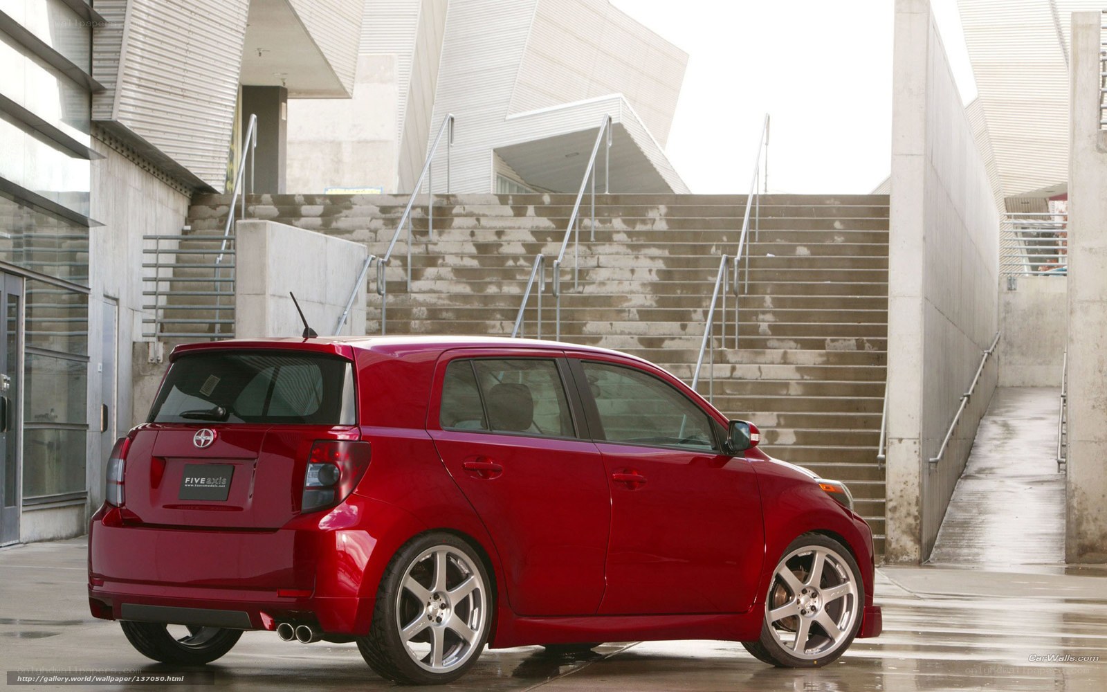 Red Scion xD parked outside