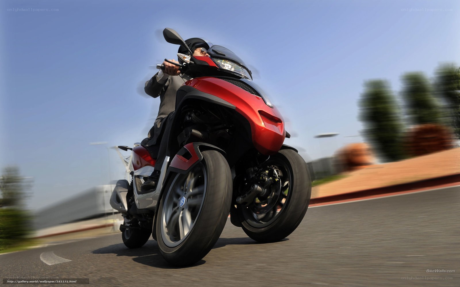 Red scooter in motion