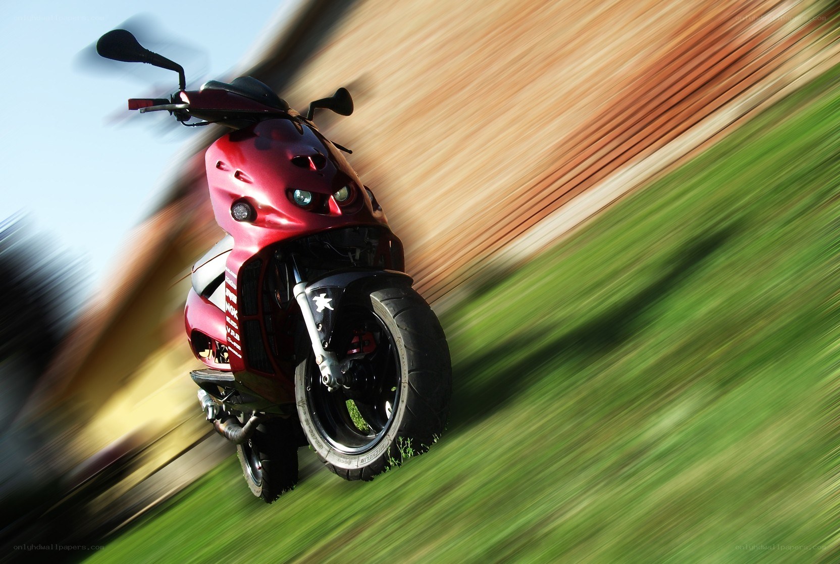 Red scooter in motion