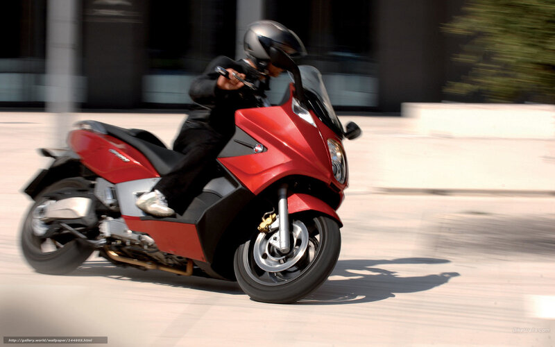 Red scooter in motion