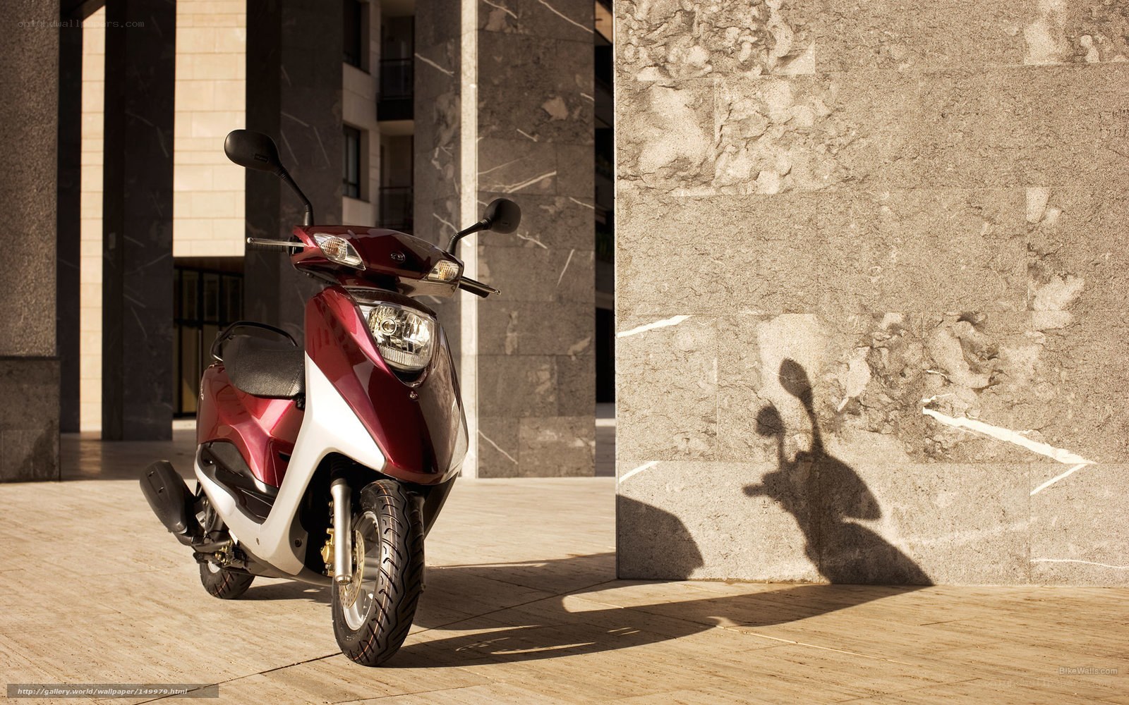 Red scooter in urban setting