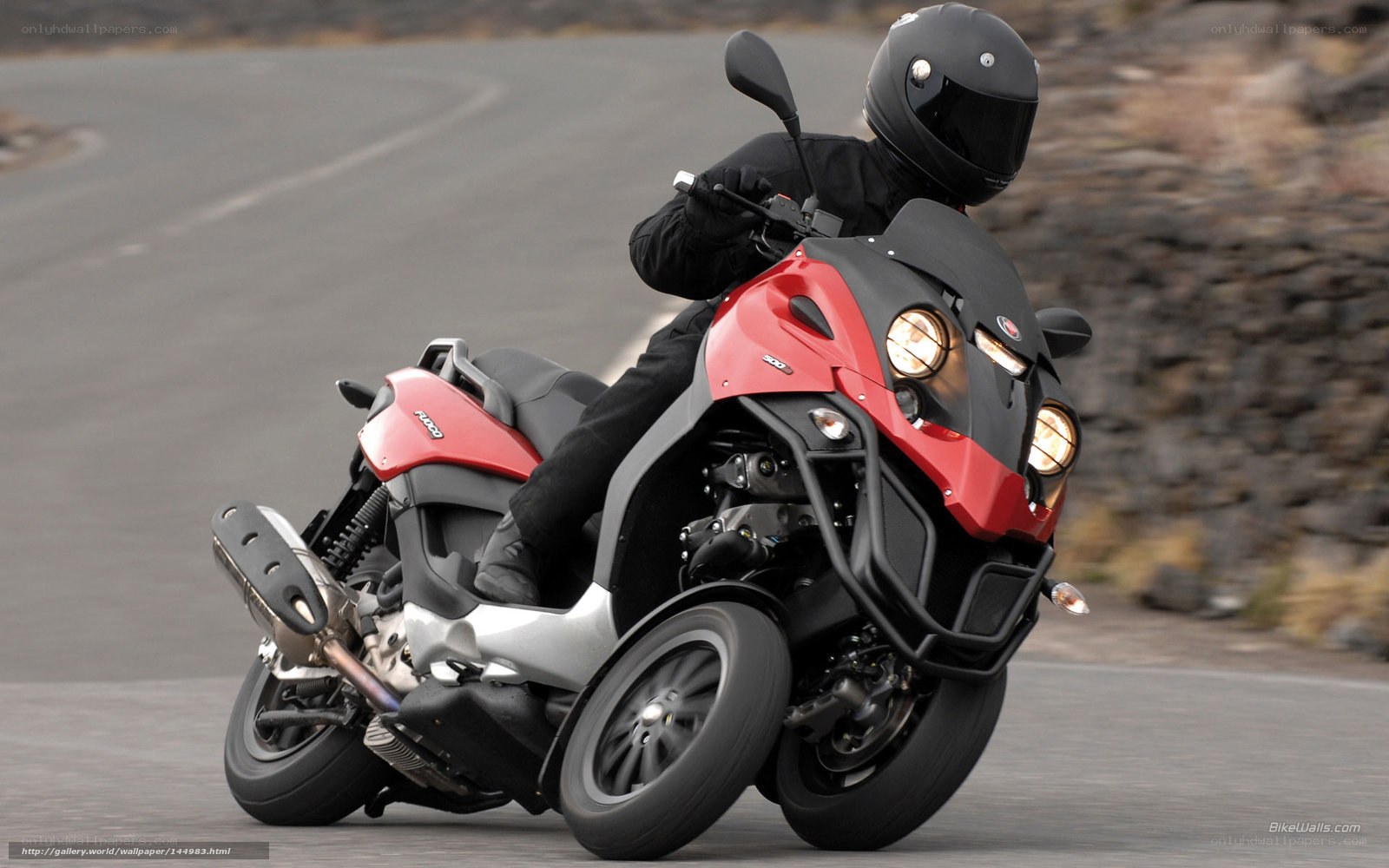 red scooter on a road
