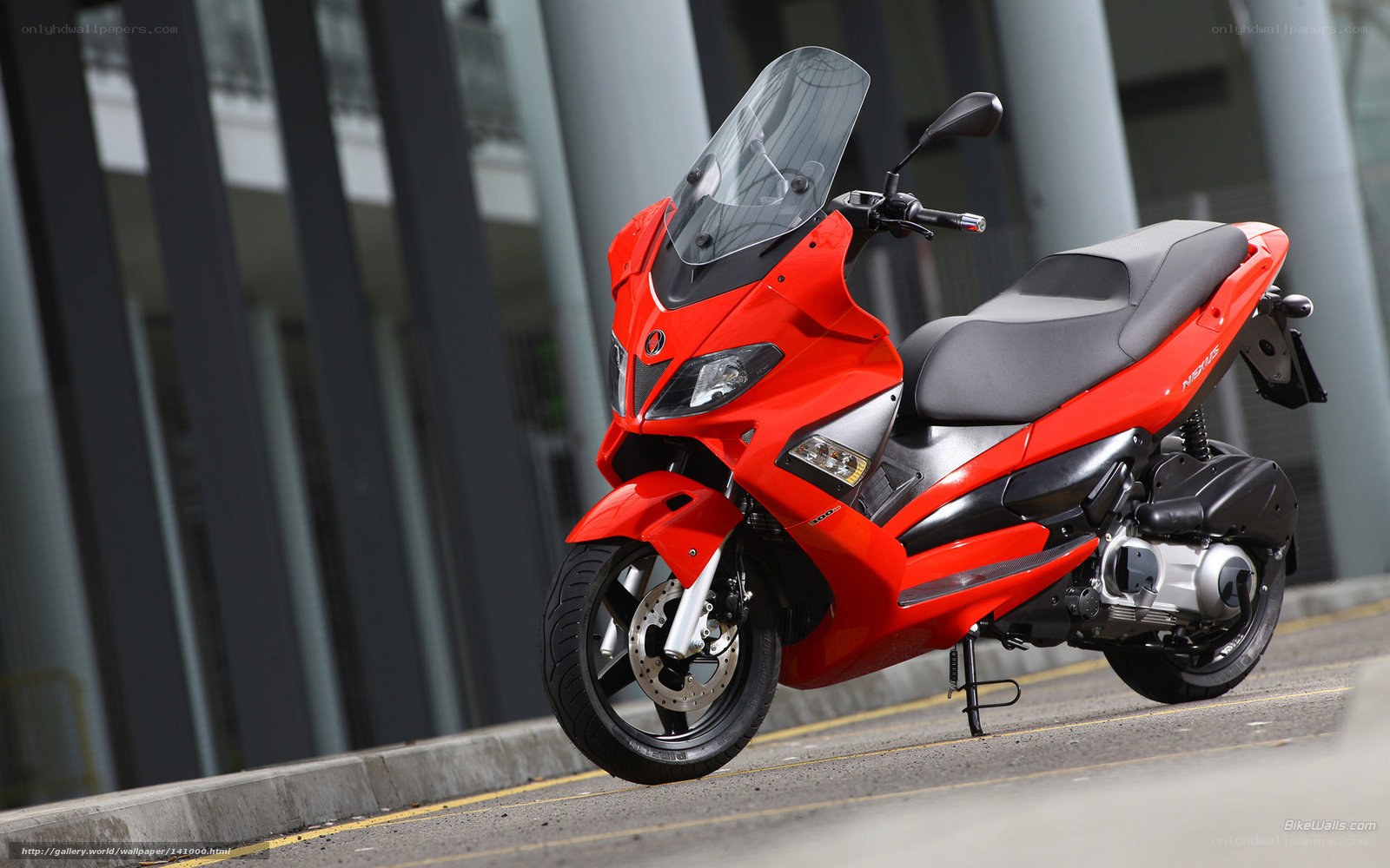 Red scooter on city street