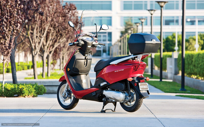 Red Scooter on Sidewalk