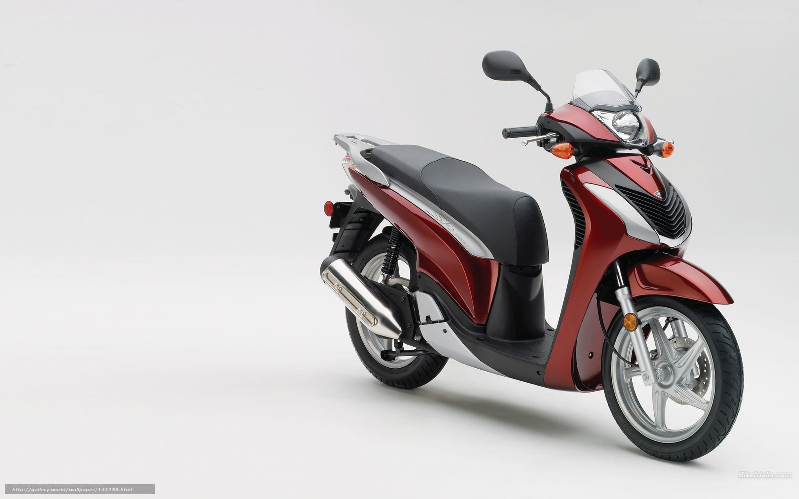 Red scooter on white background