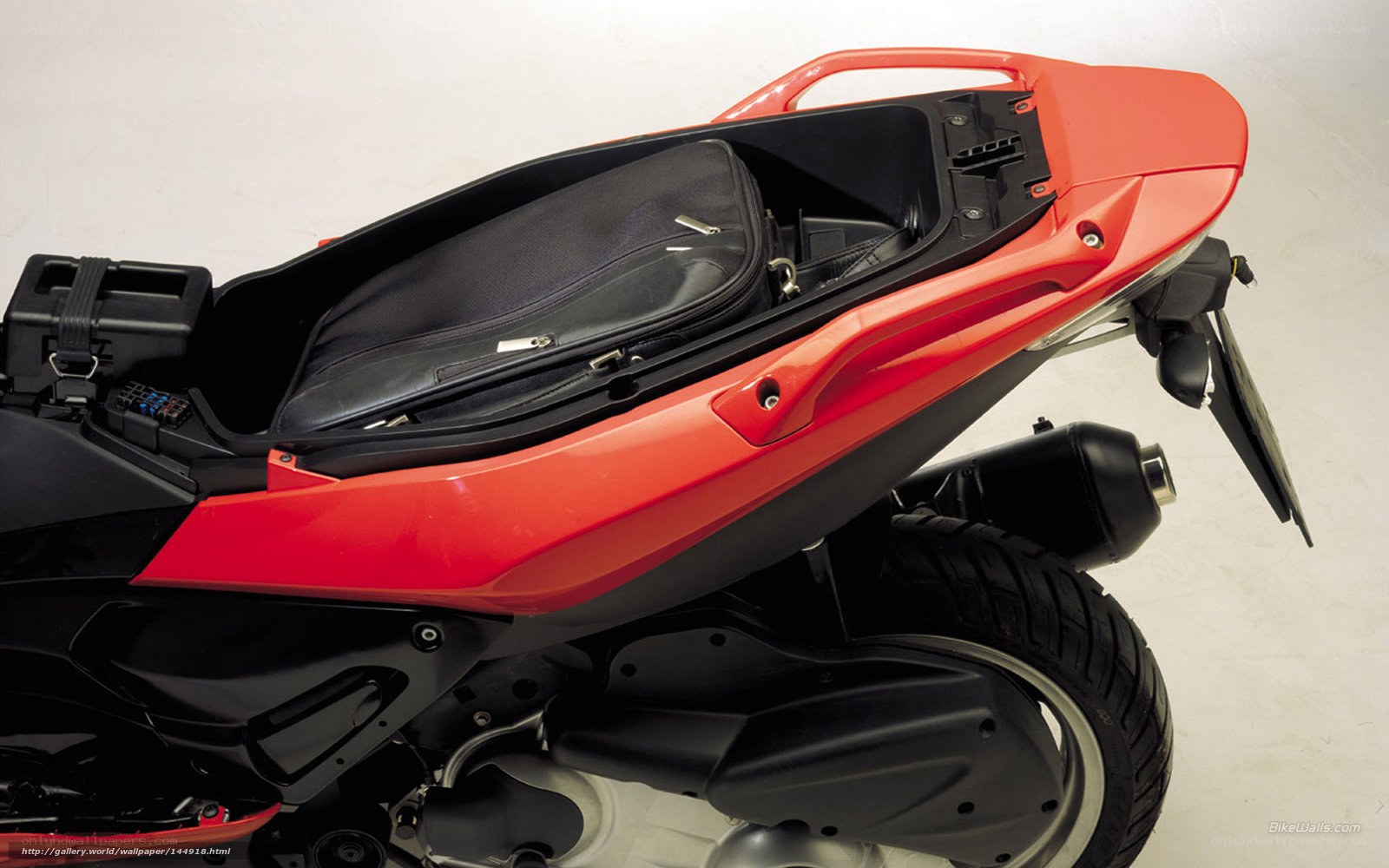 red scooter storage compartment