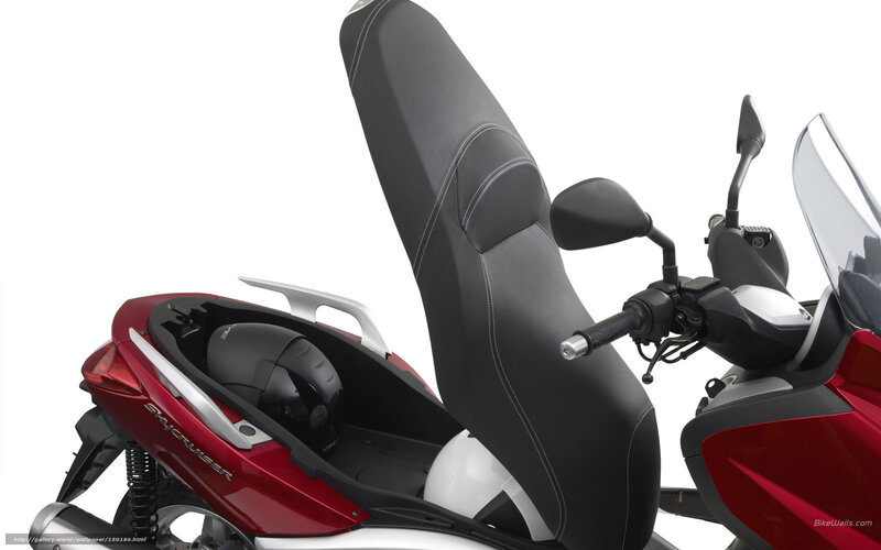 Red scooter with storage compartment