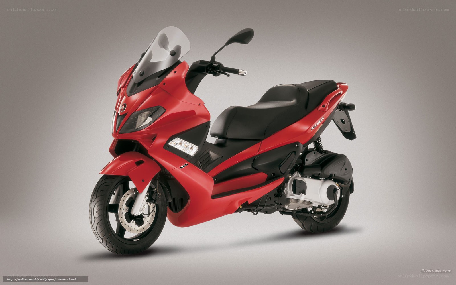 Red scooter with windscreen