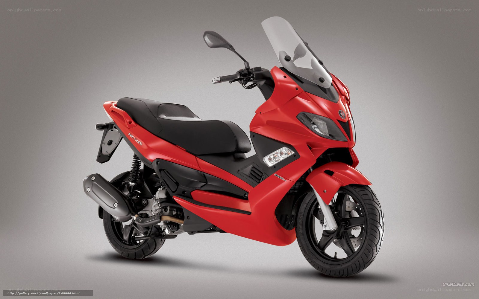 Red scooter with windscreen