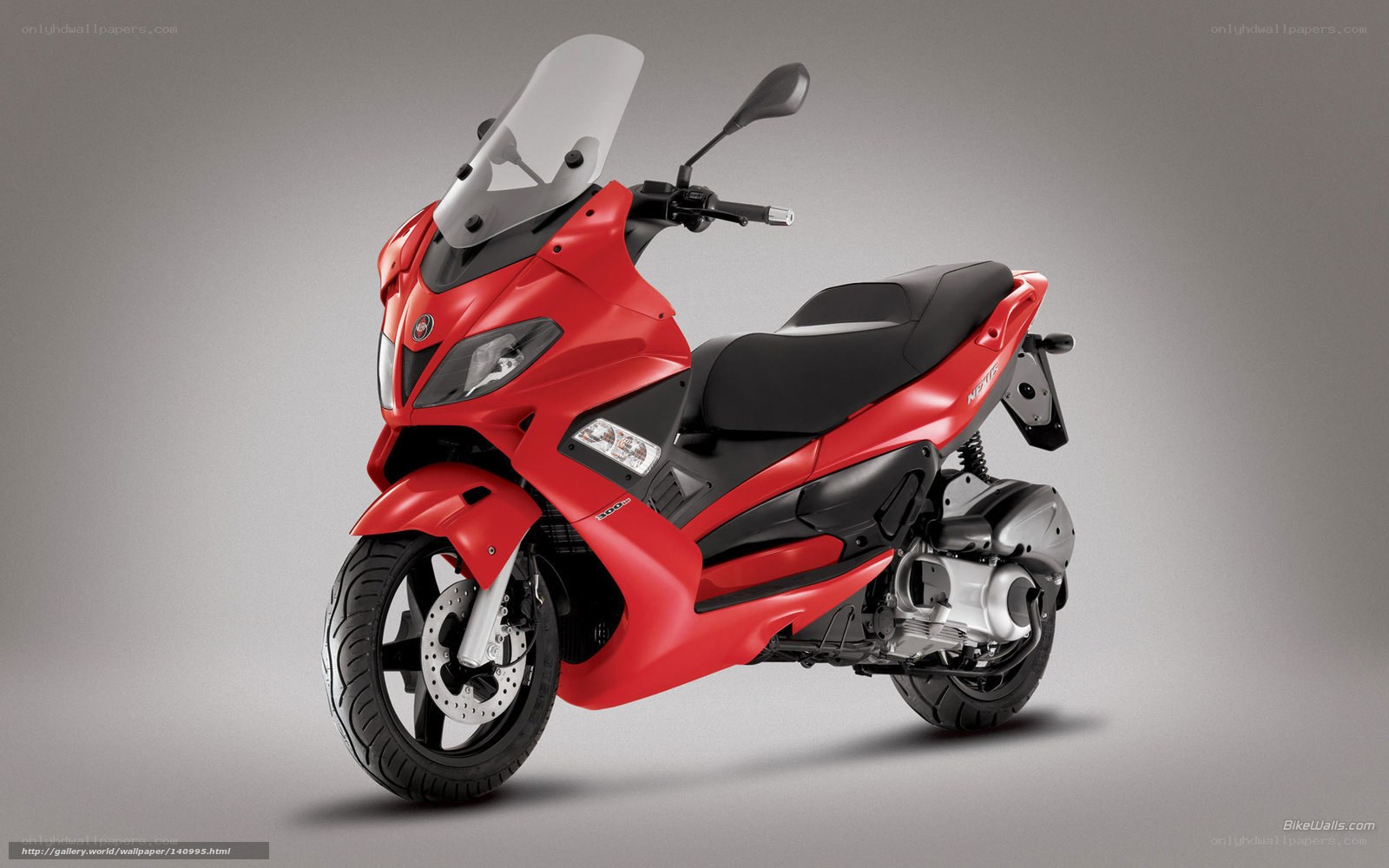 Red scooter with windscreen