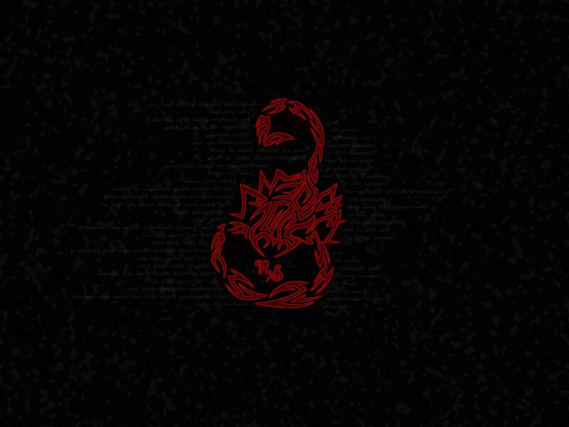 red scorpion logo on dark background