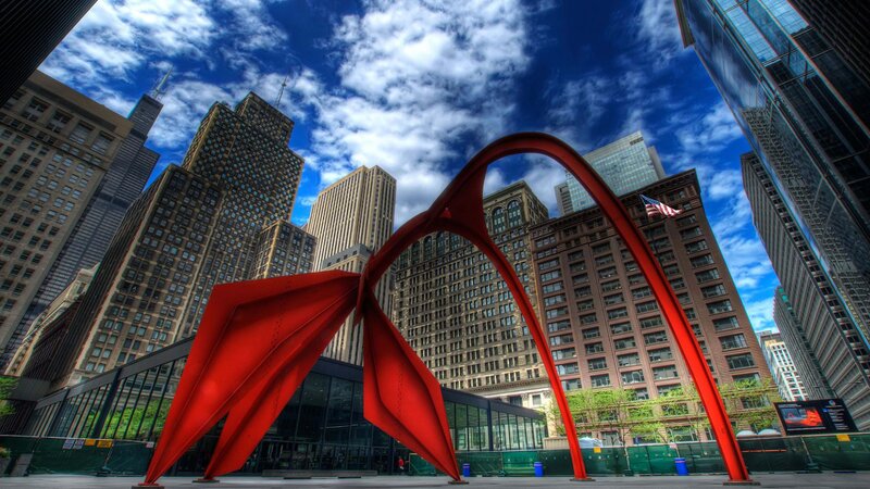Red Sculpture in City