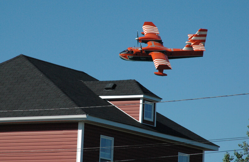 Red Seaplane Flying