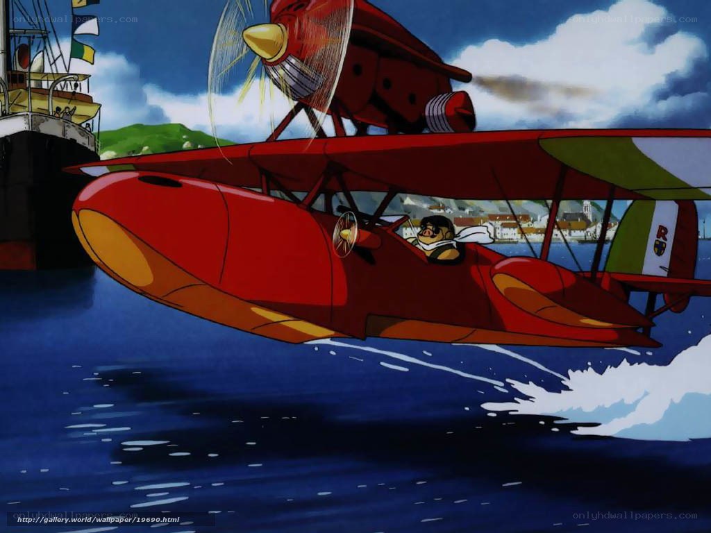 Red seaplane in flight