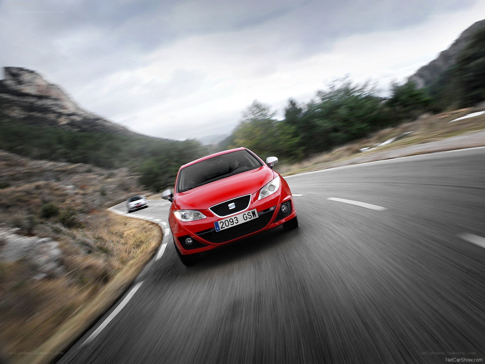 Red SEAT Leon in motion