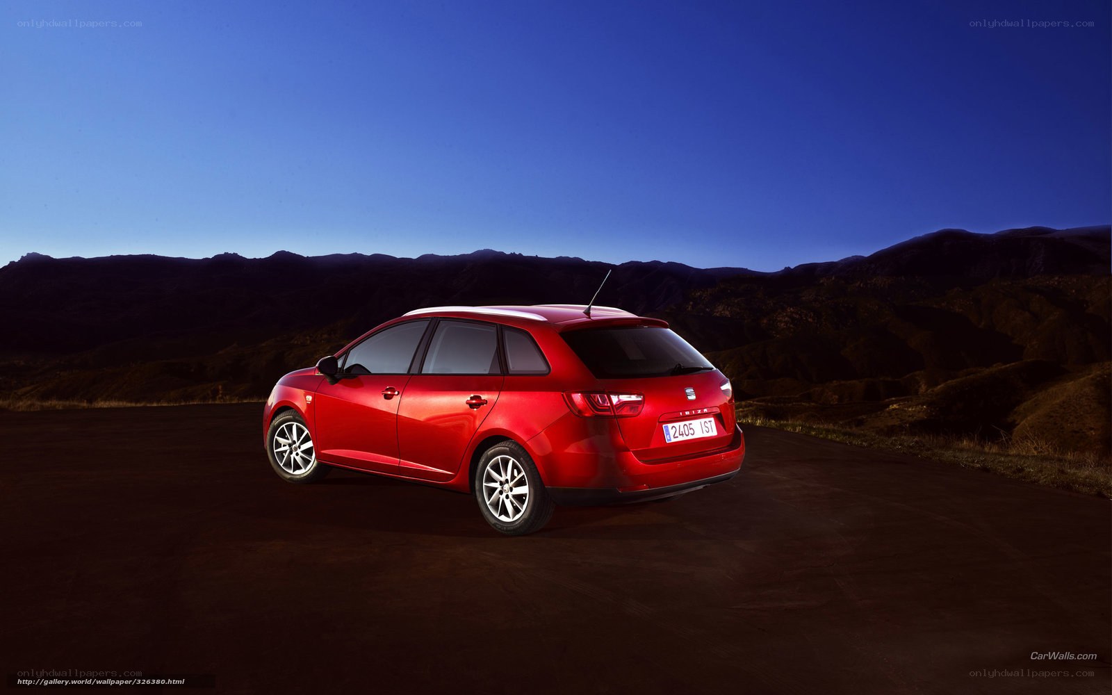 Red SEAT Leon parked at dusk