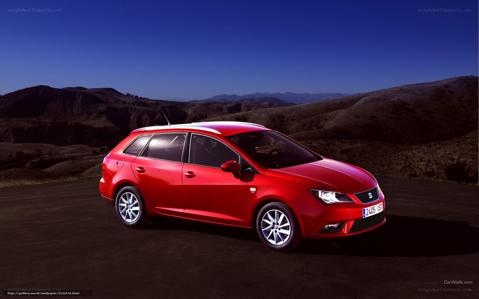 Red SEAT Leon station wagon