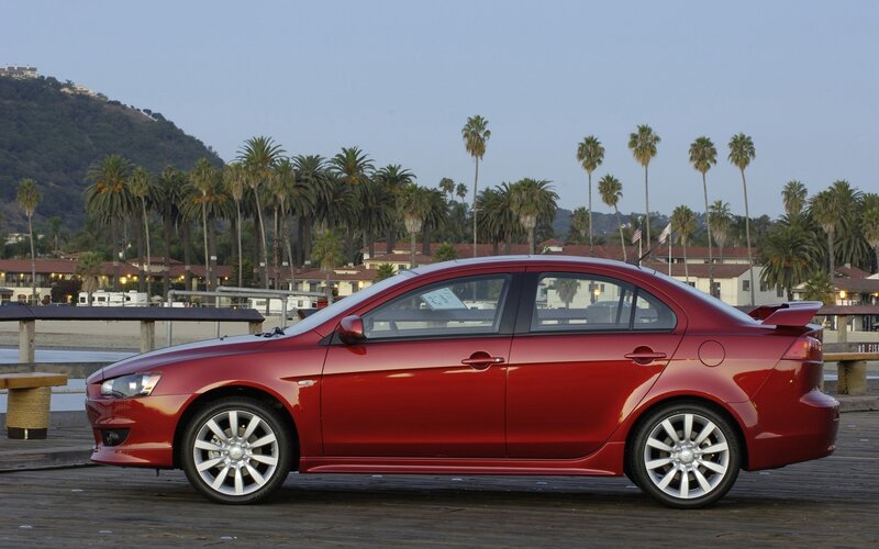 Red Sedan Car — Calm, Sunset