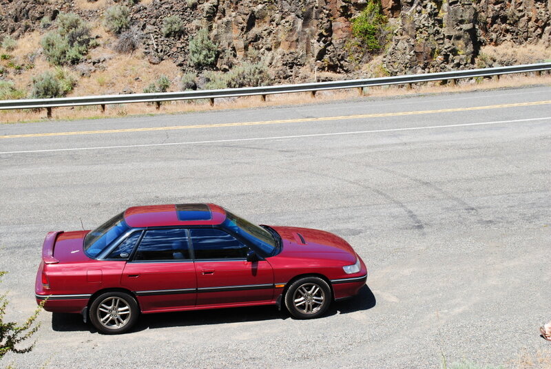 Red Sedan Car — Calm