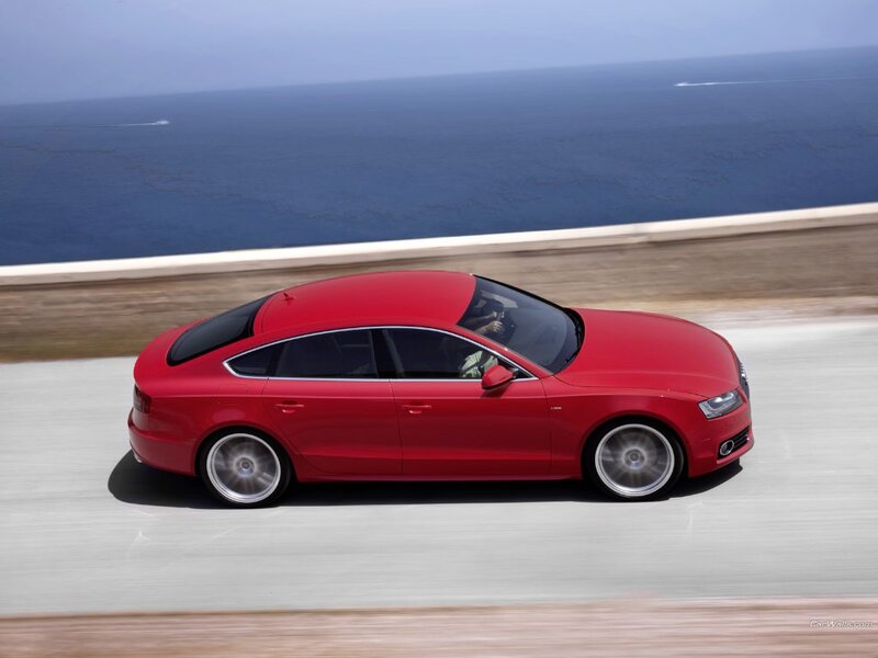 Red Sedan Car — Dynamic, Afternoon, Photograph, Road, Ocean, Blue, Gray