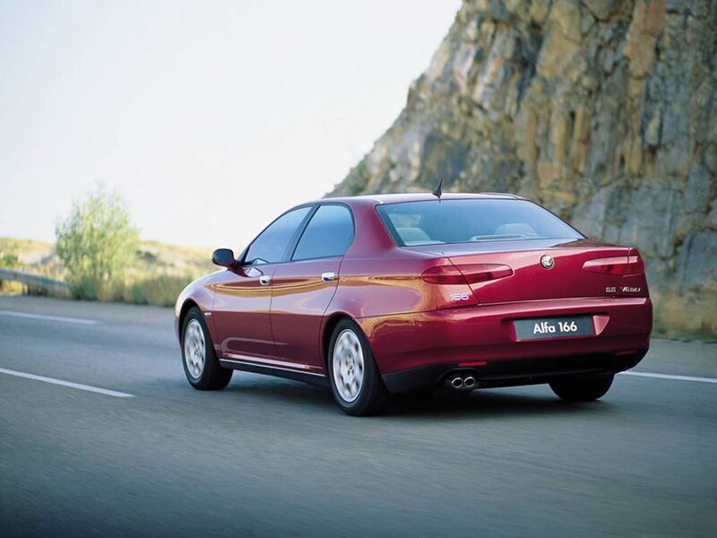 Red Sedan Car — Dynamic, Afternoon, Photograph, Road, Rocky Cliff