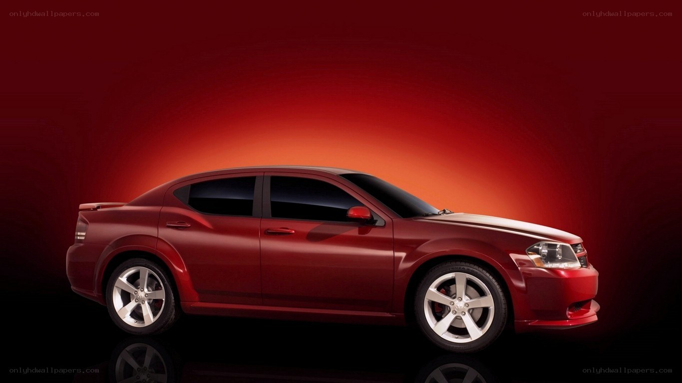 Red sedan car in studio