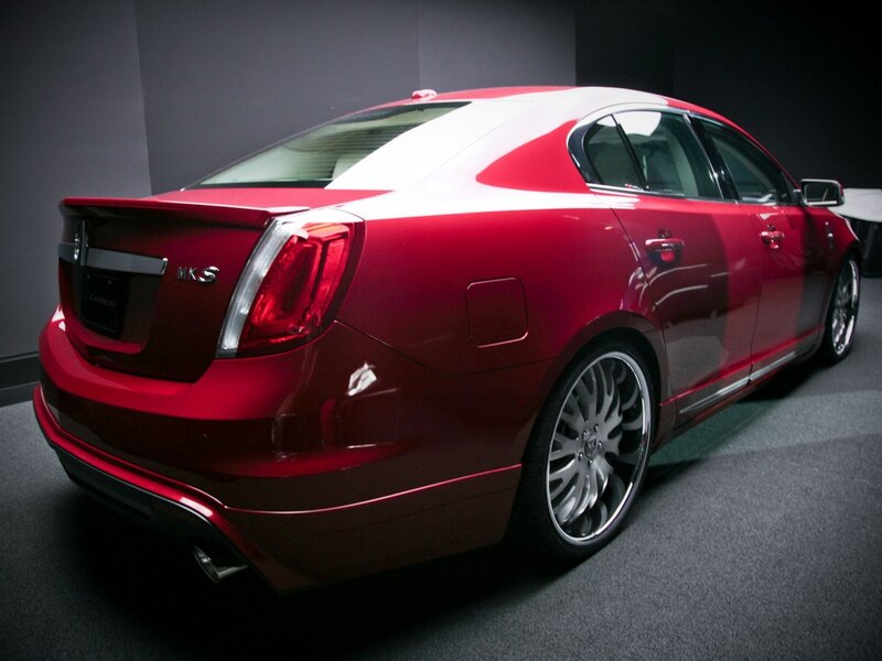 red sedan car rear view