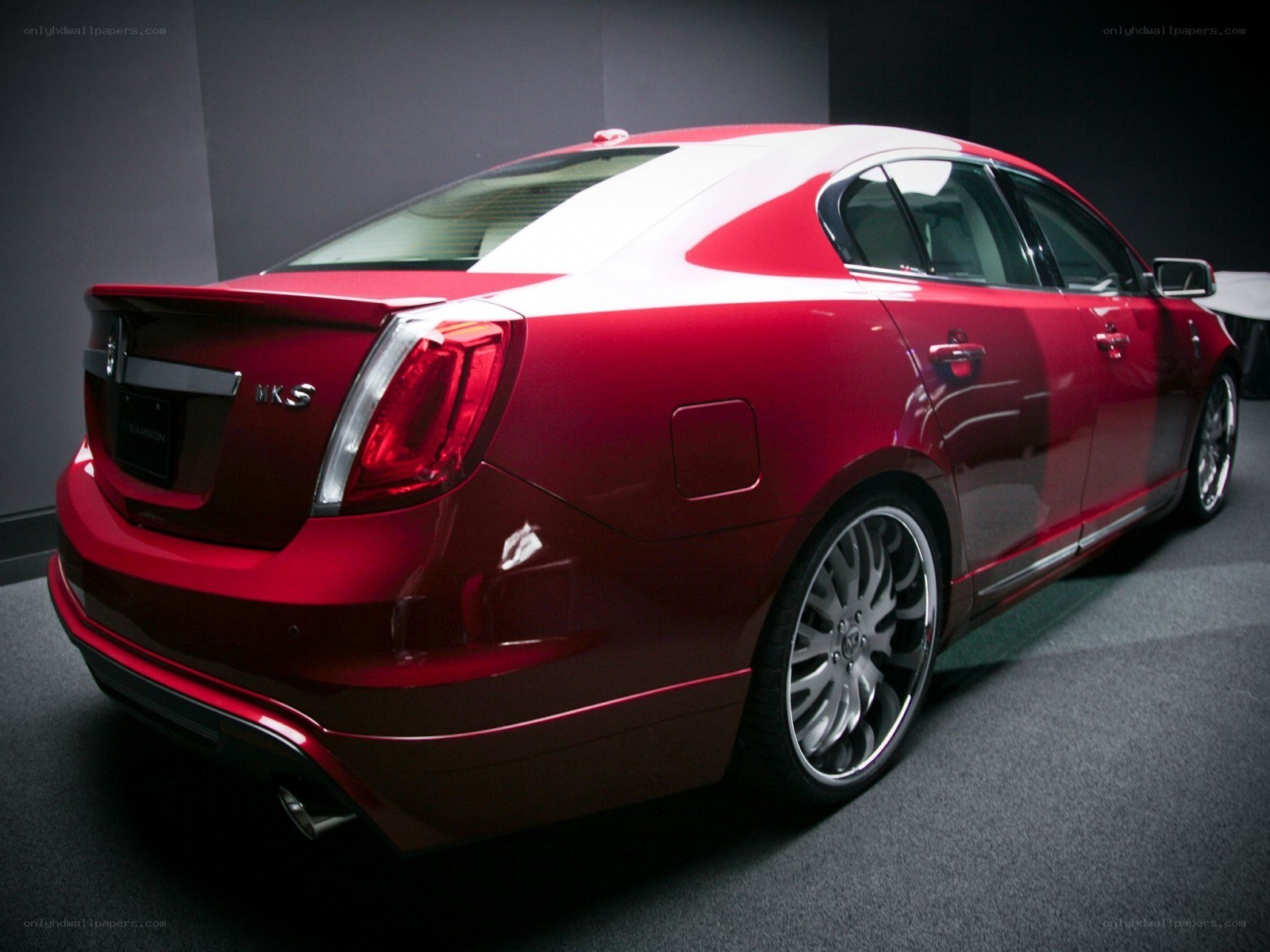 red sedan car rear view