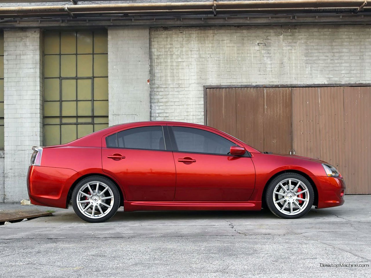 red sedan car side view