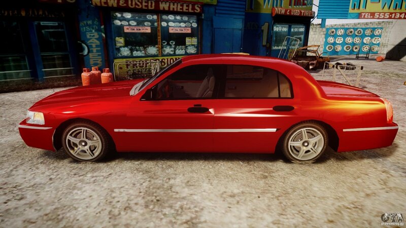 Red Sedan Car — Urban