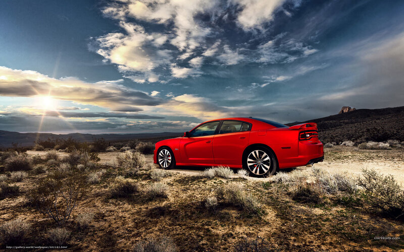 Red Sedan in Desert — Dramatic, Sunset