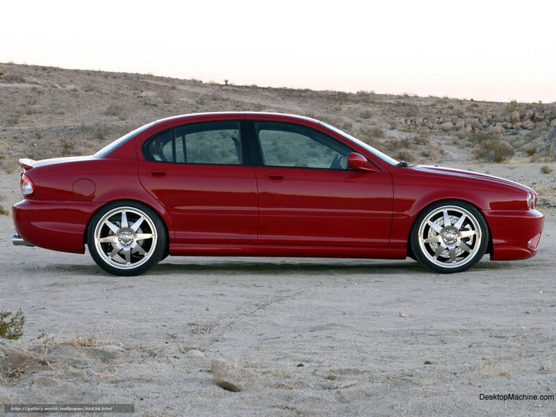 Red sedan in desert