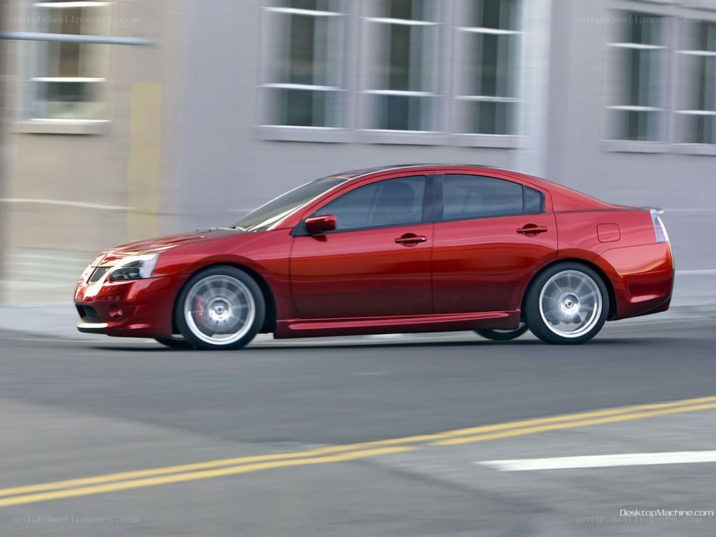 red sedan in motion