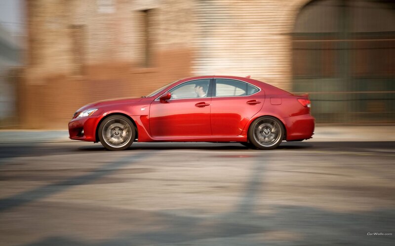 red sedan in motion