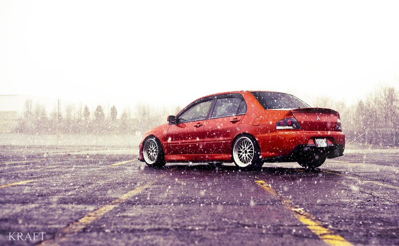 Red Sedan in Snow — Cold, Overcast
