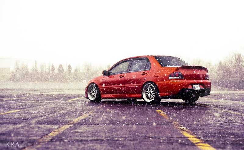 Red Sedan in Snow — Cold