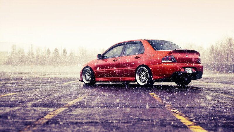 Red Sedan in Snow — Dramatic