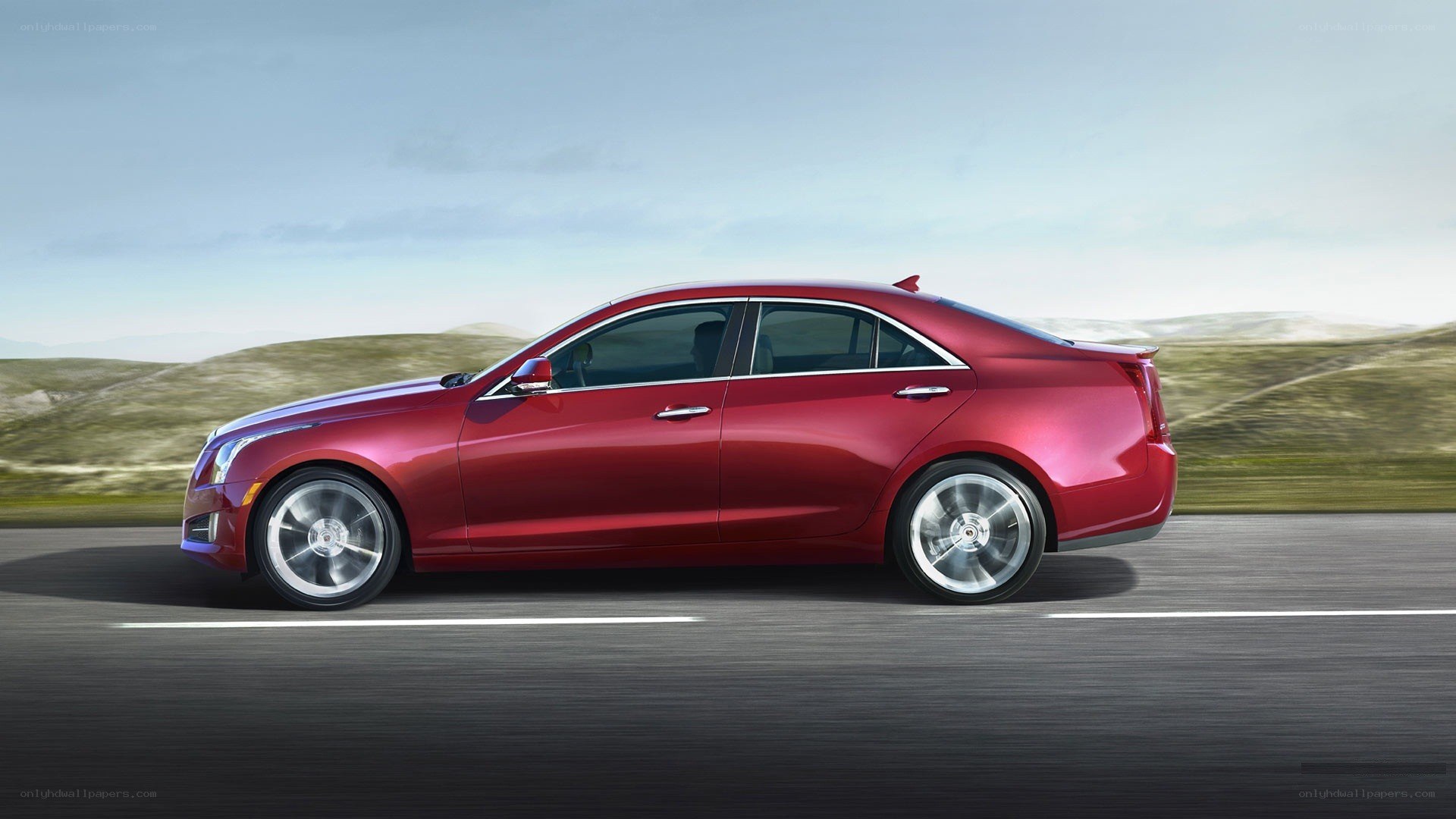 red sedan on a road