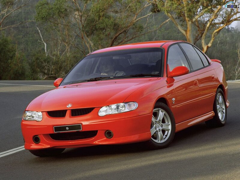 red sedan on a road