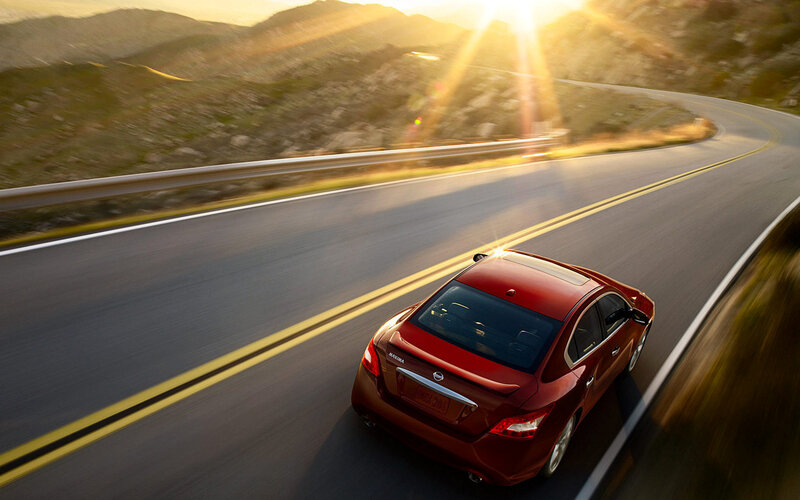 Red Sedan on Road